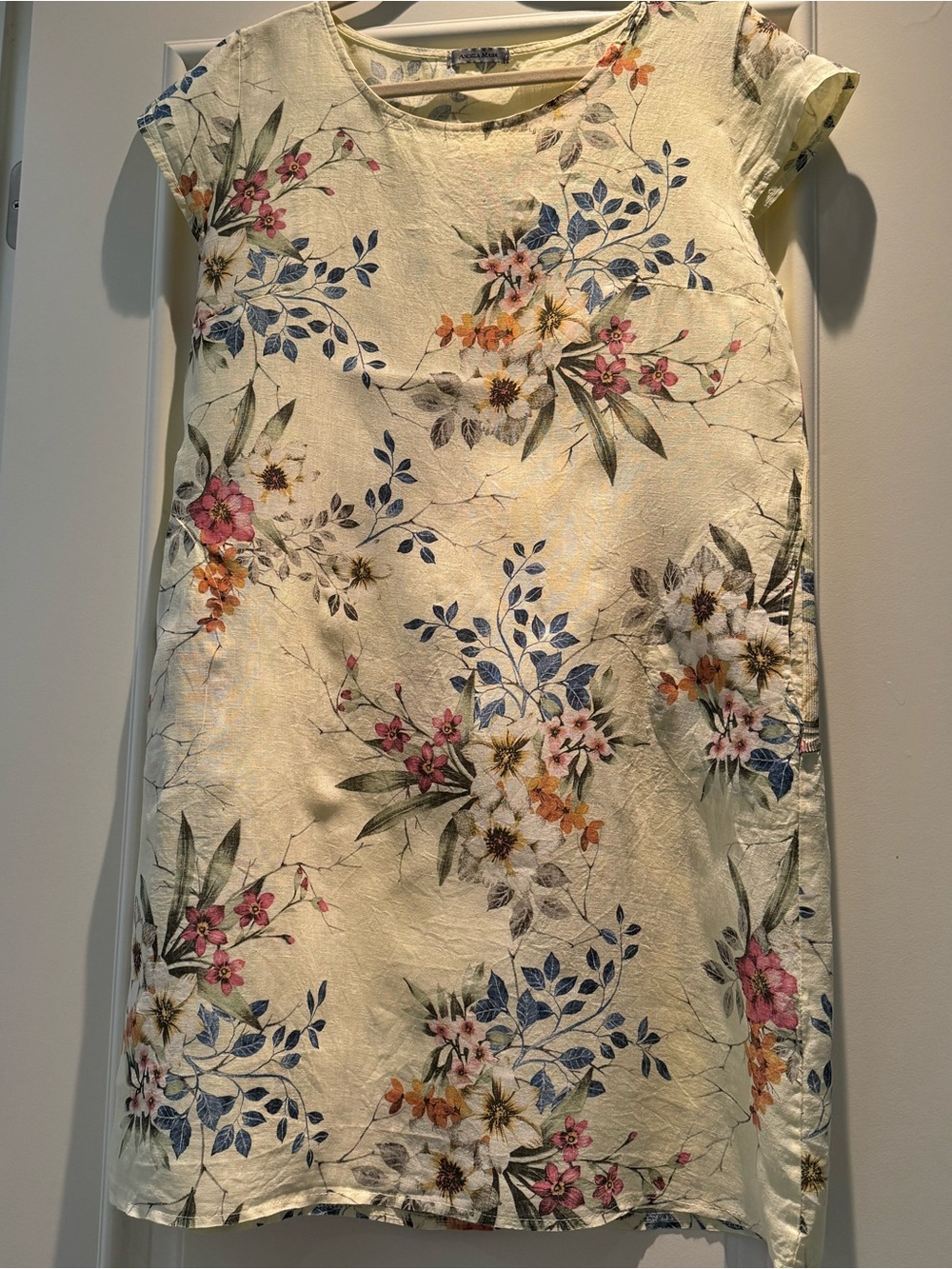 Angela Mara Italian  100 percent linen, buttercup yellow with floral design.